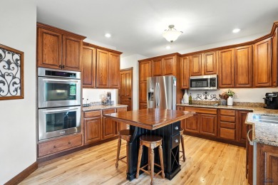Beautiful custom built, executive home in coveted Enchanted on Arrowhead Country Club in South Dakota - for sale on GolfHomes.com, golf home, golf lot