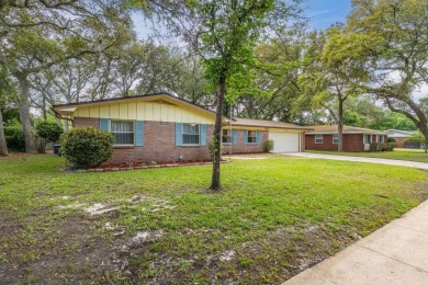 Welcome home to this beautiful, brick single-story 4 bedroom/2 on Fort Walton Beach Golf Course in Florida - for sale on GolfHomes.com, golf home, golf lot