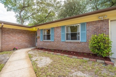 Welcome home to this beautiful, brick single-story 4 bedroom/2 on Fort Walton Beach Golf Course in Florida - for sale on GolfHomes.com, golf home, golf lot