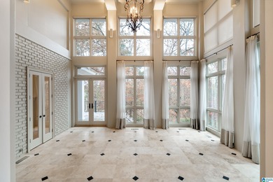This stunning all-brick executive home sits on a private 1 on Riverchase Country Club in Alabama - for sale on GolfHomes.com, golf home, golf lot