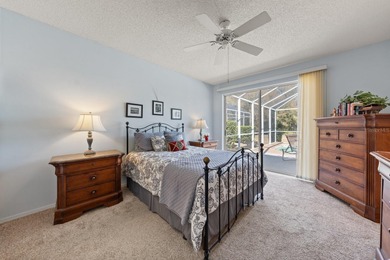 Stunning Pool Home on Premium Pond-View Lot in Gated Golf on Crescent Oaks Country Club in Florida - for sale on GolfHomes.com, golf home, golf lot