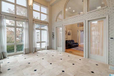 This stunning all-brick executive home sits on a private 1 on Riverchase Country Club in Alabama - for sale on GolfHomes.com, golf home, golf lot