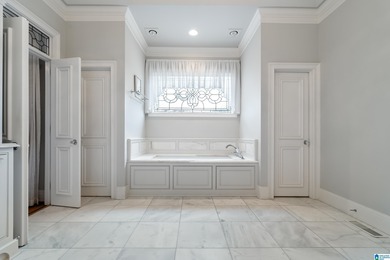 This stunning all-brick executive home sits on a private 1 on Riverchase Country Club in Alabama - for sale on GolfHomes.com, golf home, golf lot