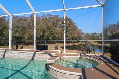 Stunning Pool Home on Premium Pond-View Lot in Gated Golf on Crescent Oaks Country Club in Florida - for sale on GolfHomes.com, golf home, golf lot