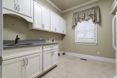 This stunning all-brick executive home sits on a private 1 on Riverchase Country Club in Alabama - for sale on GolfHomes.com, golf home, golf lot