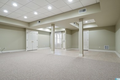 This stunning all-brick executive home sits on a private 1 on Riverchase Country Club in Alabama - for sale on GolfHomes.com, golf home, golf lot