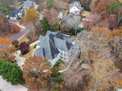 This stunning all-brick executive home sits on a private 1 on Riverchase Country Club in Alabama - for sale on GolfHomes.com, golf home, golf lot