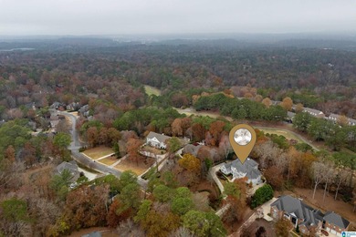 This stunning all-brick executive home sits on a private 1 on Riverchase Country Club in Alabama - for sale on GolfHomes.com, golf home, golf lot