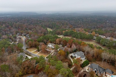 This stunning all-brick executive home sits on a private 1 on Riverchase Country Club in Alabama - for sale on GolfHomes.com, golf home, golf lot
