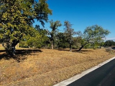 Nice flat, buildable lot with several oak trees, close to on Slick Rock Golf Course - Horseshoe Bay in Texas - for sale on GolfHomes.com, golf home, golf lot