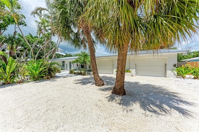 Discover Mia Bella -- a rare canal-front estate on Anna Maria on Key Royale Club in Florida - for sale on GolfHomes.com, golf home, golf lot