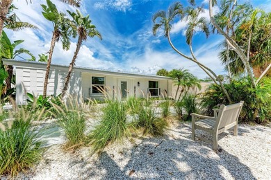 Discover Mia Bella -- a rare canal-front estate on Anna Maria on Key Royale Club in Florida - for sale on GolfHomes.com, golf home, golf lot
