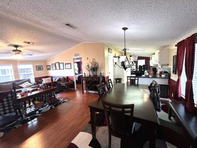 This home is located within a 55+ resort style leased land on Big Cypress Golf and Country Club in Florida - for sale on GolfHomes.com, golf home, golf lot