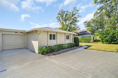 Beautifully updated villa-style condo with an oversized attached on Highland Lakes Executive Golf Course in Florida - for sale on GolfHomes.com, golf home, golf lot