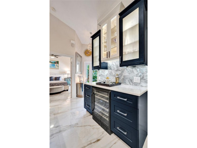 Stop--you will regret missing the opportunity to experience on Palm-Aire Country Club and Resort - The Oaks in Florida - for sale on GolfHomes.com, golf home, golf lot