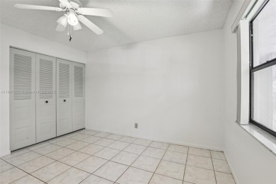 Beautifully Renovated 1st-Floor Waterfront Condo in Active 55+ on Sunrise Lakes Phase IV Golf Course in Florida - for sale on GolfHomes.com, golf home, golf lot