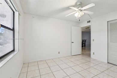 Beautifully Renovated 1st-Floor Waterfront Condo in Active 55+ on Sunrise Lakes Phase IV Golf Course in Florida - for sale on GolfHomes.com, golf home, golf lot