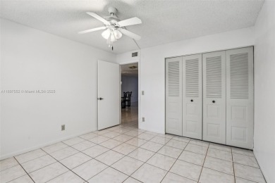 Beautifully Renovated 1st-Floor Waterfront Condo in Active 55+ on Sunrise Lakes Phase IV Golf Course in Florida - for sale on GolfHomes.com, golf home, golf lot