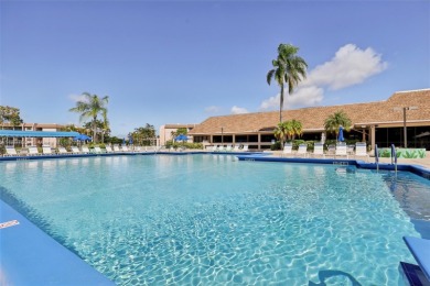 Beautifully Renovated 1st-Floor Waterfront Condo in Active 55+ on Sunrise Lakes Phase IV Golf Course in Florida - for sale on GolfHomes.com, golf home, golf lot