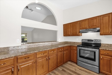 Under contract-accepting backup offers. Charming neighborhood on Green Valley Country Club in Florida - for sale on GolfHomes.com, golf home, golf lot