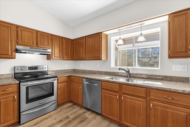 Under contract-accepting backup offers. Charming neighborhood on Green Valley Country Club in Florida - for sale on GolfHomes.com, golf home, golf lot