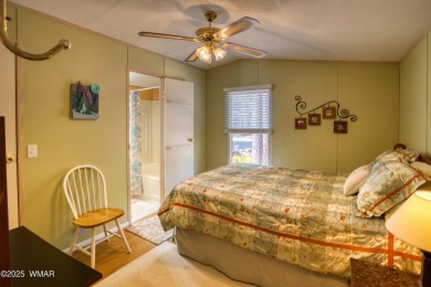 Located in Pinetop Lakes Mobile Homes. Single wide w/shed out on Pinetop Lakes Golf and Country Club in Arizona - for sale on GolfHomes.com, golf home, golf lot
