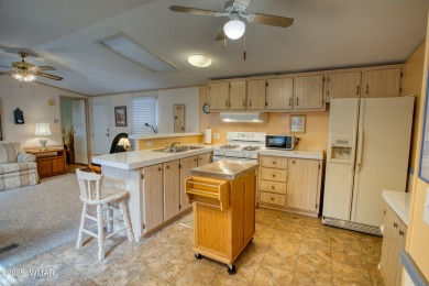 Located in Pinetop Lakes Mobile Homes. Single wide w/shed out on Pinetop Lakes Golf and Country Club in Arizona - for sale on GolfHomes.com, golf home, golf lot