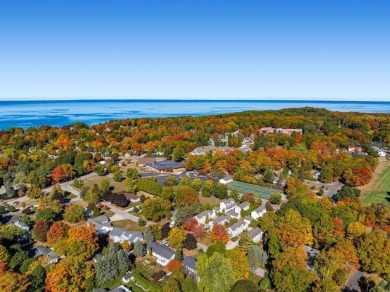 This pristine building site in an ideal location just minutes on Charlevoix Golf Club in Michigan - for sale on GolfHomes.com, golf home, golf lot