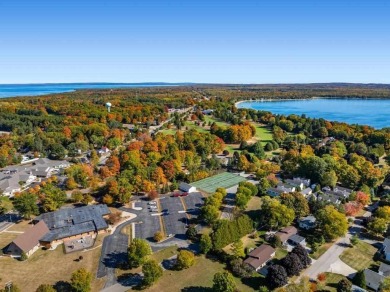 This pristine building site in an ideal location just minutes on Charlevoix Golf Club in Michigan - for sale on GolfHomes.com, golf home, golf lot