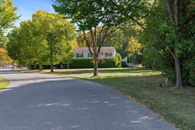 This pristine building site in an ideal location just minutes on Charlevoix Golf Club in Michigan - for sale on GolfHomes.com, golf home, golf lot