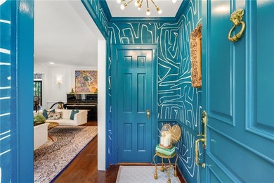 Welcome home to one of the most beloved homes in Collier on Bobby Jones Golf Club in Georgia - for sale on GolfHomes.com, golf home, golf lot