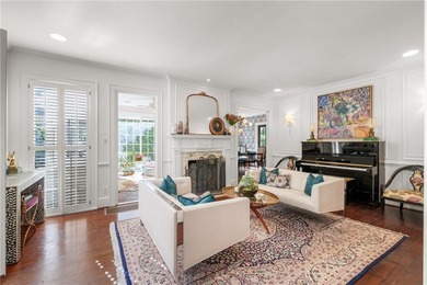 Welcome home to one of the most beloved homes in Collier on Bobby Jones Golf Club in Georgia - for sale on GolfHomes.com, golf home, golf lot