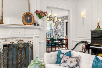 Welcome home to one of the most beloved homes in Collier on Bobby Jones Golf Club in Georgia - for sale on GolfHomes.com, golf home, golf lot