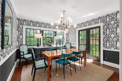 Welcome home to one of the most beloved homes in Collier on Bobby Jones Golf Club in Georgia - for sale on GolfHomes.com, golf home, golf lot