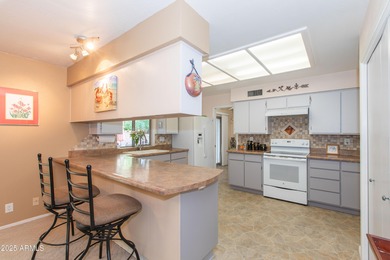 This beautifully cared-for Sunland Village home has been lightly on Sunland Village Golf Club in Arizona - for sale on GolfHomes.com, golf home, golf lot