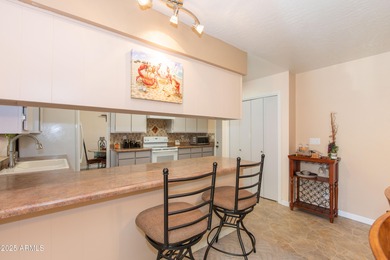 This beautifully cared-for Sunland Village home has been lightly on Sunland Village Golf Club in Arizona - for sale on GolfHomes.com, golf home, golf lot