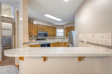 Welcome home to this maintenance-provided townhome ideally on Minor Park Golf Course in Missouri - for sale on GolfHomes.com, golf home, golf lot