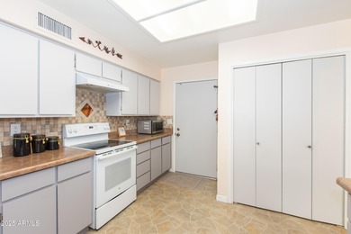 This beautifully cared-for Sunland Village home has been lightly on Sunland Village Golf Club in Arizona - for sale on GolfHomes.com, golf home, golf lot