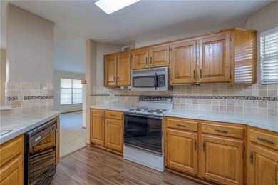 Welcome home to this maintenance-provided townhome ideally on Minor Park Golf Course in Missouri - for sale on GolfHomes.com, golf home, golf lot