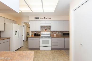 This beautifully cared-for Sunland Village home has been lightly on Sunland Village Golf Club in Arizona - for sale on GolfHomes.com, golf home, golf lot