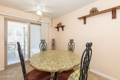 This beautifully cared-for Sunland Village home has been lightly on Sunland Village Golf Club in Arizona - for sale on GolfHomes.com, golf home, golf lot