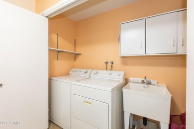 This beautifully cared-for Sunland Village home has been lightly on Sunland Village Golf Club in Arizona - for sale on GolfHomes.com, golf home, golf lot