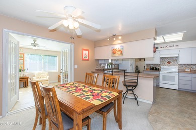 This beautifully cared-for Sunland Village home has been lightly on Sunland Village Golf Club in Arizona - for sale on GolfHomes.com, golf home, golf lot