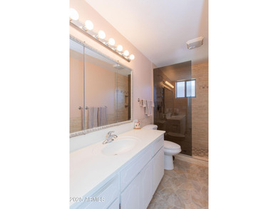 This beautifully cared-for Sunland Village home has been lightly on Sunland Village Golf Club in Arizona - for sale on GolfHomes.com, golf home, golf lot