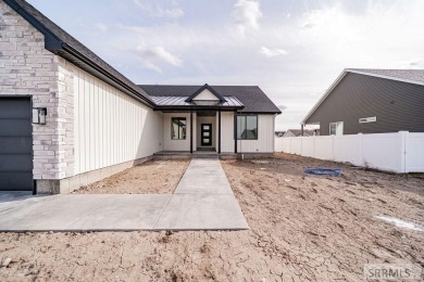 Welcome to this beautifully crafted 7-bedroom, 3-bathroom home on Sage Lakes Municipal Golf Course in Idaho - for sale on GolfHomes.com, golf home, golf lot