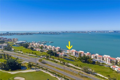 Enjoy sweeping open water views of Boca Ciega Bay from this on Isla Del Sol Yacht and Country Club in Florida - for sale on GolfHomes.com, golf home, golf lot