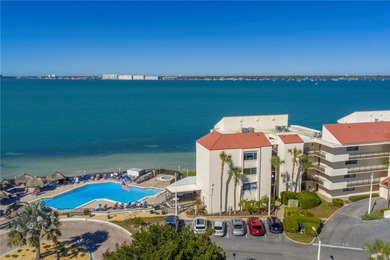 Enjoy sweeping open water views of Boca Ciega Bay from this on Isla Del Sol Yacht and Country Club in Florida - for sale on GolfHomes.com, golf home, golf lot