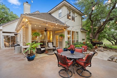 Nestled beneath a canopy of mature trees and overlooking the on Slick Rock Golf Course - Horseshoe Bay in Texas - for sale on GolfHomes.com, golf home, golf lot