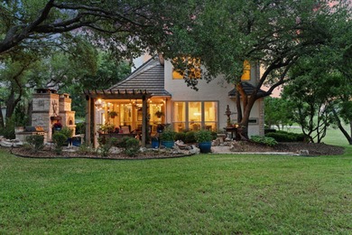 Nestled beneath a canopy of mature trees and overlooking the on Slick Rock Golf Course - Horseshoe Bay in Texas - for sale on GolfHomes.com, golf home, golf lot