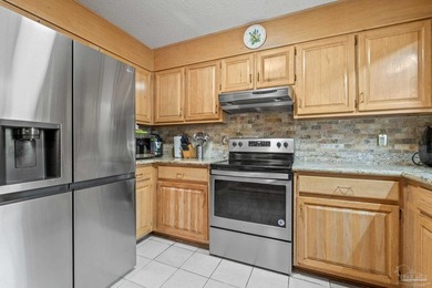 Welcome to this all-brick beauty in the sought-after Tanglewood on Tanglewood Golf Club in Florida - for sale on GolfHomes.com, golf home, golf lot